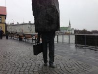 Monument to the Unknown Bureaucrat - a man with a weight on his shoulders.